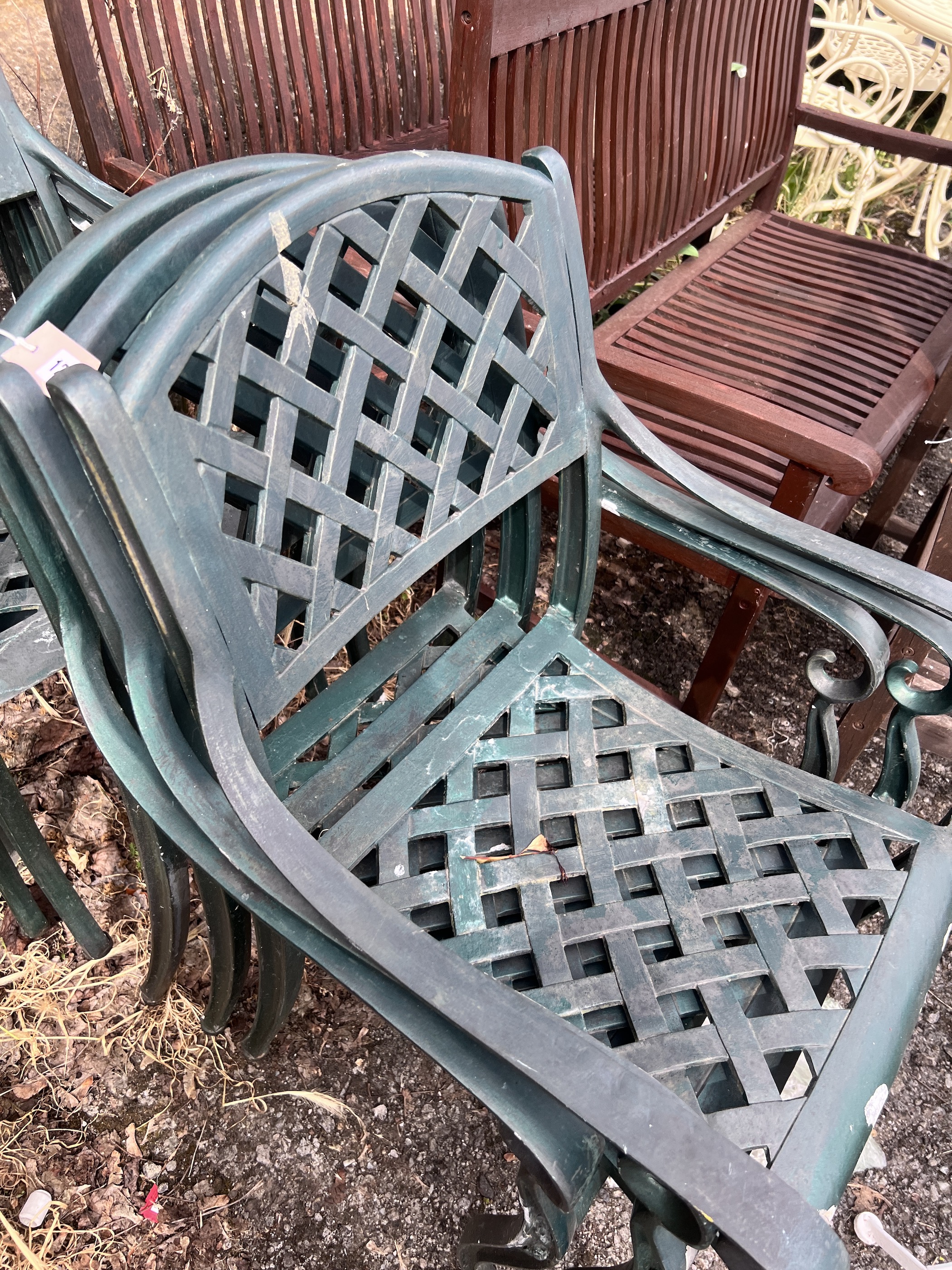 A set of six painted aluminium stacking garden elbow chairs